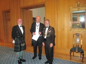 Deacon Gordon Masterton with Piper Tom Broderick and pianist Liam Devlin